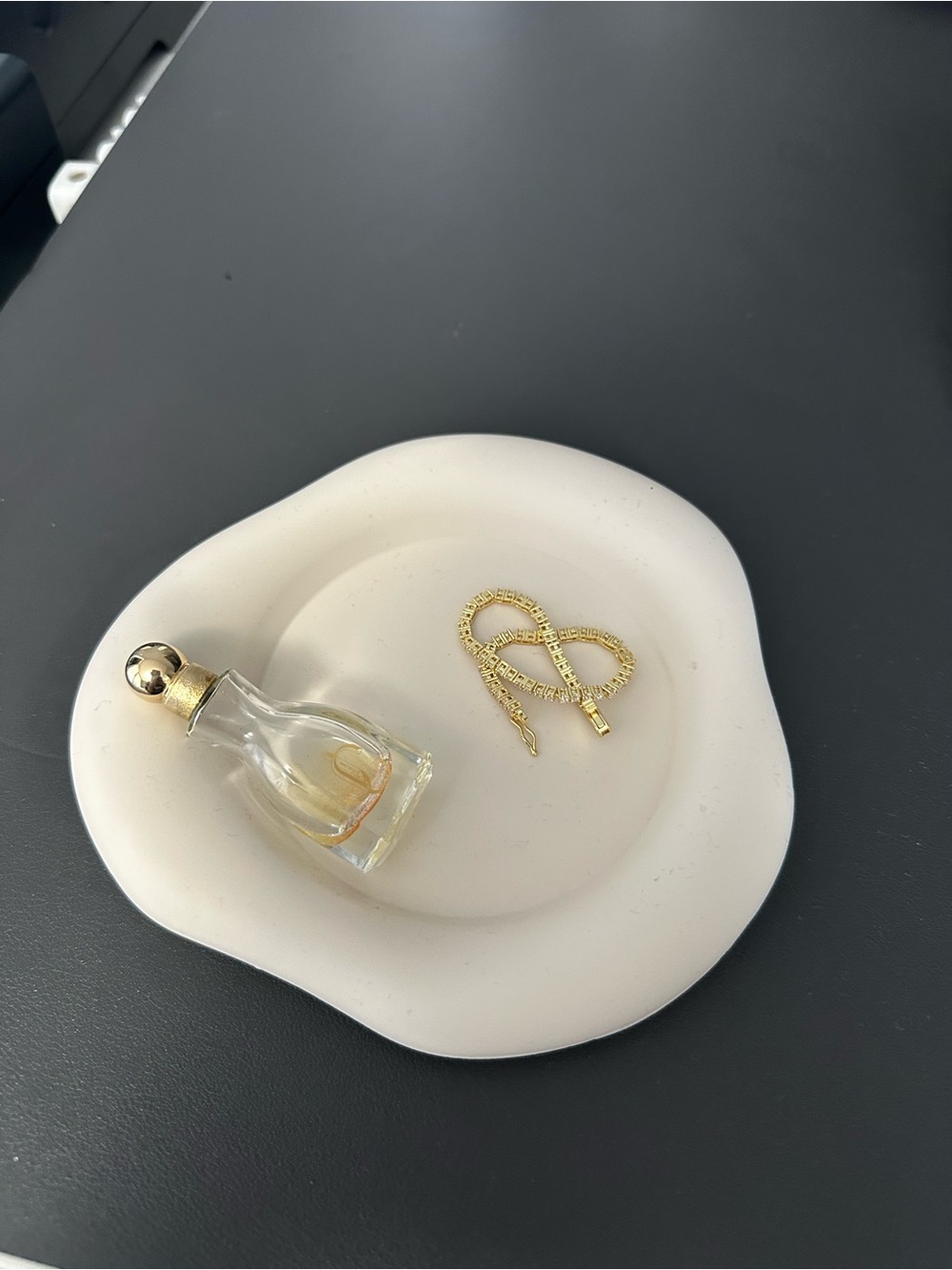 Brand new comes in packaging jewelry plate (great gift)